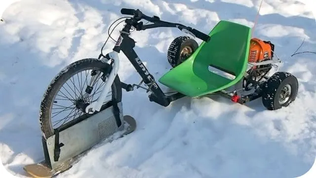 Снегоход с велосипедом